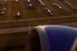 A hot-air balloon is ready to take advantage of the dusk-hour as we climb-out.